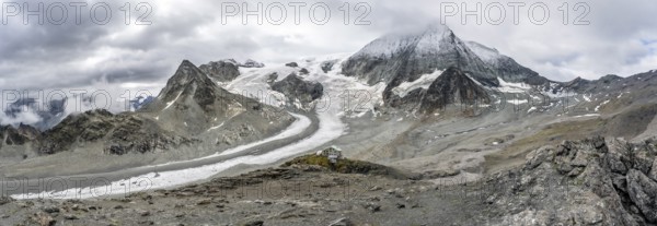 Panorama mountain hut Cabane des Dix in front of glacier Glacier de Cheilon and summit Mont Blanc