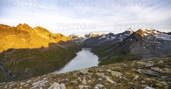 Picturesque mountain landscape at the summit Mont de la Blana at sunset, view of blue mountain