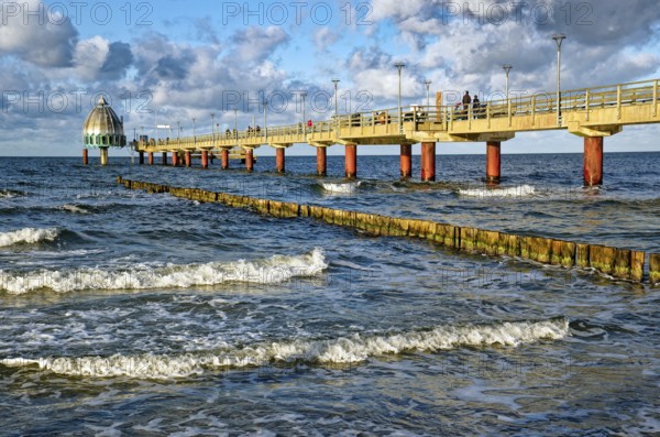 Diving gondola at the Zingst pier, cloudy mood and waves, Baltic Sea coast, Zingst,