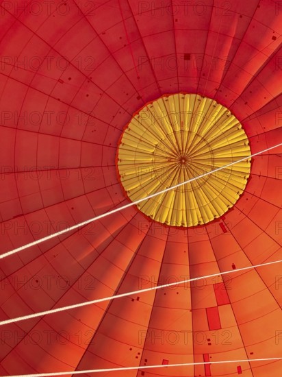 Hot air balloon inside view, top opens to release warm air before landing. Hot air balloon ride