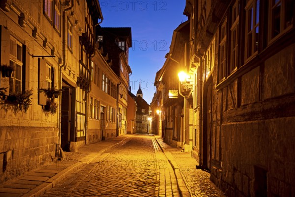 Half-timbered houses in a narrow street with cobblestones, Old Town in the evening, World Heritage
