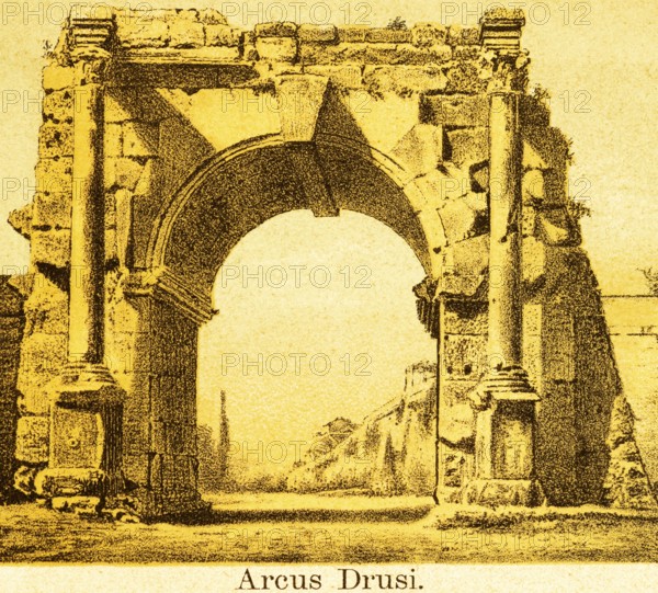 Ruin Arcus Drusi, city gate with lateral columns, part of the fortification, street, ancient Rome,