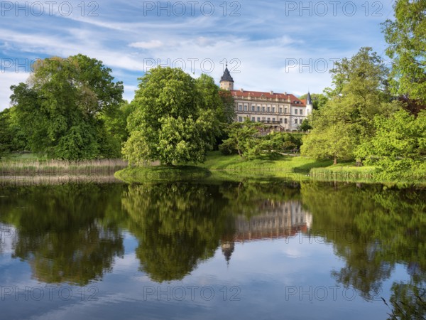 Wiesenburg Castle and Park, reflection in the lake, English landscape park, Wiesenburg, Hoher