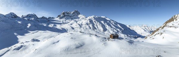 Alpine panorama, aerial view with Kesch hut, Alpine Club hut of the SAC in winter, Albula Alps,