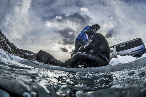 Scuba diver on the ice, Lake Baikal, Olkhon Island, Pribaikalsky National Park, Irkutsk Province,