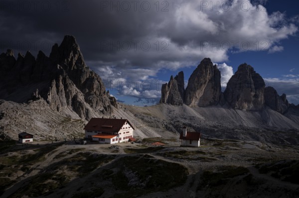 Stormy atmosphere, view of the Three Peaks Hut, chapel, Paternkofel, Three Peaks, South Tyrol,