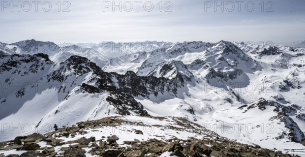 View of snow-covered mountain panorama, view from Sulzkogel, in the back summit Gamskogel and