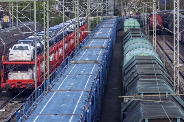 Sindelfingen railway station. Goods trains parked on the tracks. Automotive RailNet. Car transport