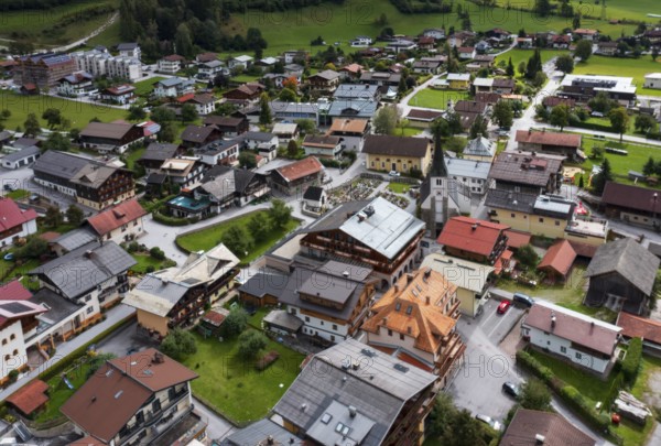 Drone image, residential buildings, view of village with parish church, Dorfgastein, Gasteinertal,