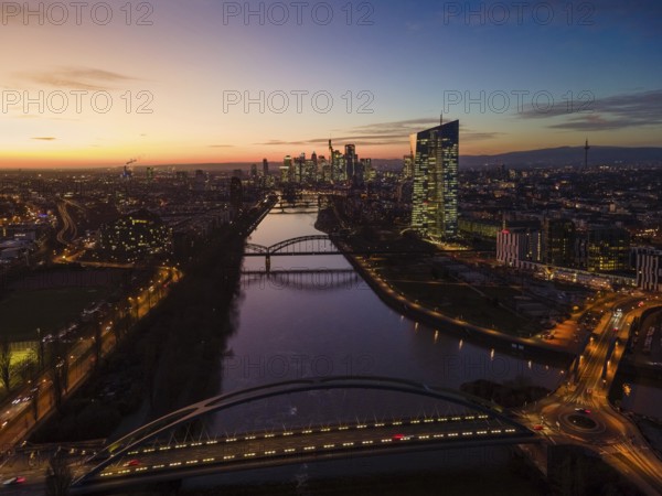 The lights in the offices of the European Central Bank (ECB) and in the skyscrapers of Frankfurt's