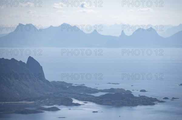 Mountain peak and fjord Austensfjorden, fjord landscape and sea, view from the summit of