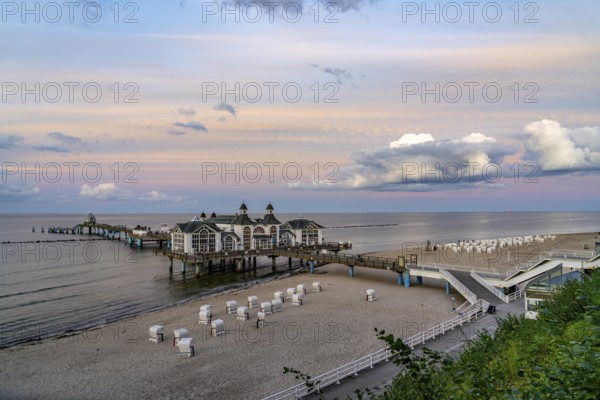 The pier of Sellin, evening mood, sunset, 394 metres long, with restaurant, jetty, beach chairs,