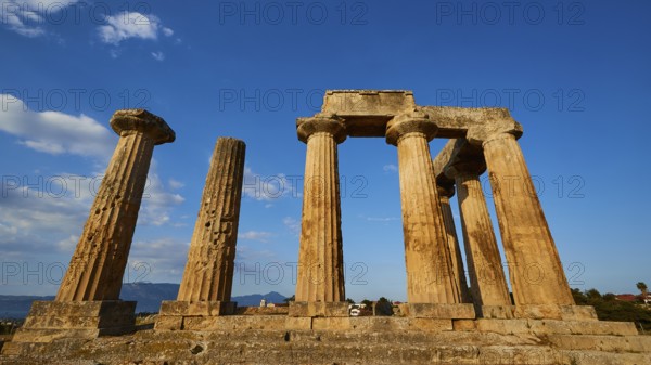 Archaic Temple of Apollo, Doric columns, Ancient Greek ruins with columns and blue sky,