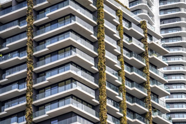 Facade of the Eden Tower on Europa-Allee in Frankfurt am Main, green facade, residential building,