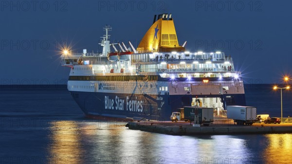 Large illuminated ferry in the harbour at night, Pigadia, town and harbour, Bluestar Chios ferry at