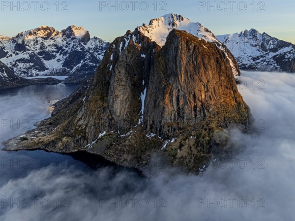 Aerial view, steep mountains, coast, winter, fog, morning light, Reine, Moskenesoya, Lofoten,