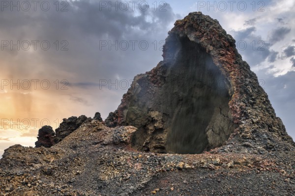 Cave, smoke, volcanic landscape of the Fire Mountains, Montañas del Fuego, Timanfaya National Park,