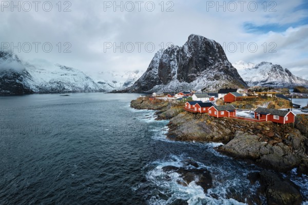Hamnoy fishing village with red rorbu houses in Norwegian fjord in winter. Lofoten Islands, Norway,