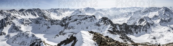 Snow-covered mountain panorama from the summit of the Sulzkogel, view of the peaks of the Stubai