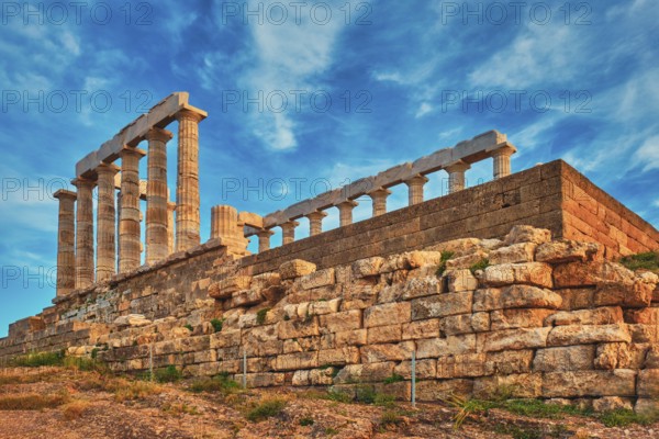 Greece Cape Sounio. Ruins of an ancient temple of Poseidon, Greek god of the sea, on sunset. Shot