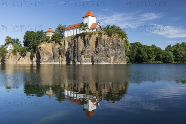 Kirchbruch lake and mountain church with water tower, Beucha, Leipzig district, Saxony, Germany,