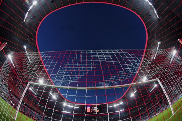 Overview, interior, floodlit match, behind-the-goal perspective, goal net, blue hour, fisheye shot,