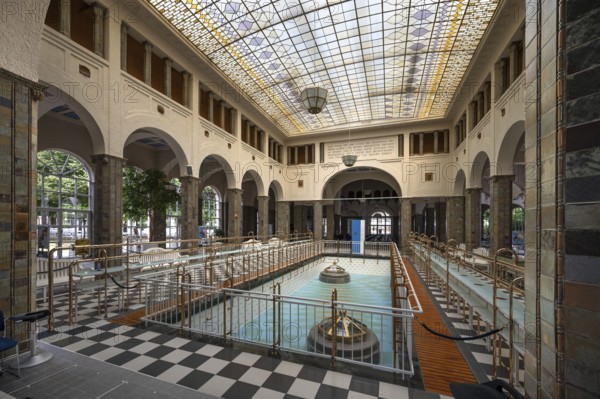 Historic fountain hall with glass dome, inaugurated in 1842, replaced by a new building in 1911,