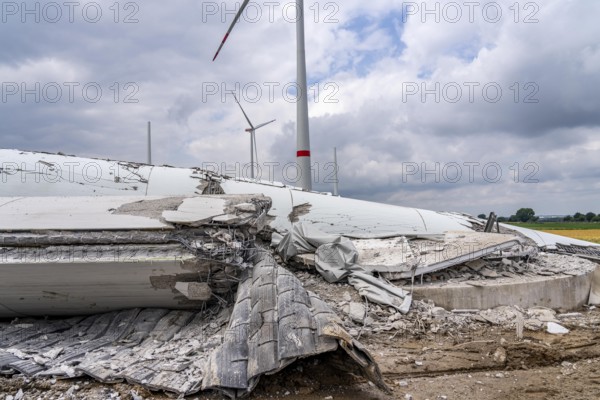 Demolished tower of a 20 year old wind turbine, in the Werl wind farm, 5 old Enercon E-66 turbines