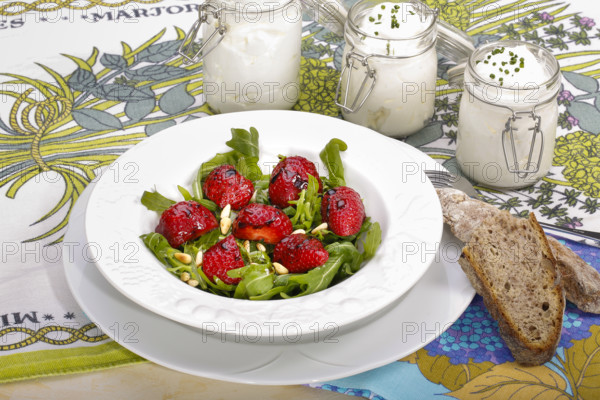 Swabian cuisine, Luggeles cheese in a jar, salad rocket with strawberries, pine nuts, Swabian cream
