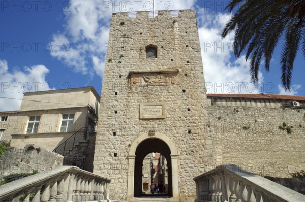 Stairs and medieval city gate leading into the old town of Korcula, Marco Polo, Adriatic Sea,