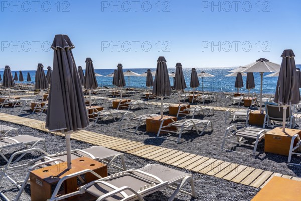Beach, empty, organised, with sun loungers and parasols, catering, bay at Koutsounari Beach, on the