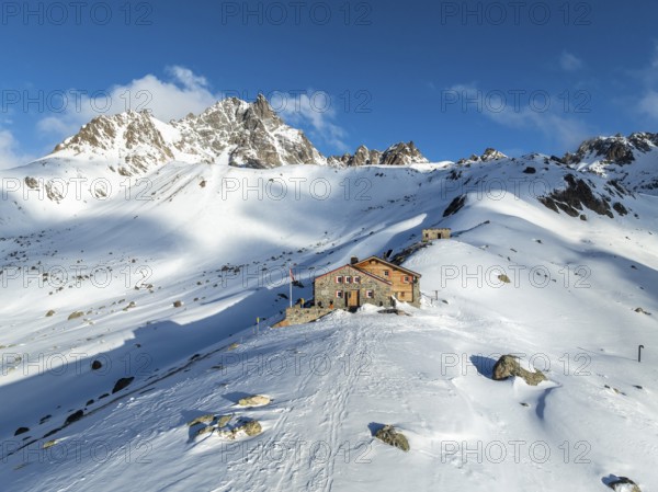SAC Alpine Club hut in winter, Chamanna d'Es-cha, Pitz Blaisun, Albula Alps, Grisons, Switzerland,