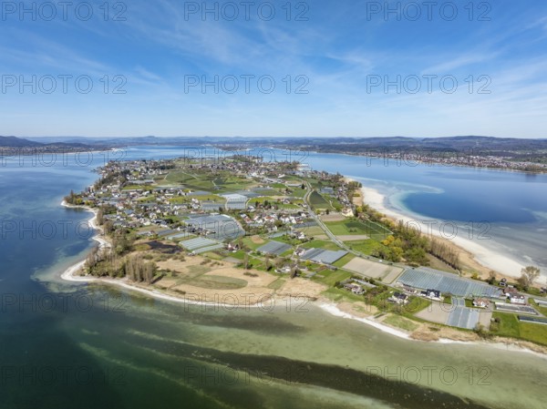 Aerial view of the island of Reichenau at low tide and spring-like vegetation, Lake Constance,
