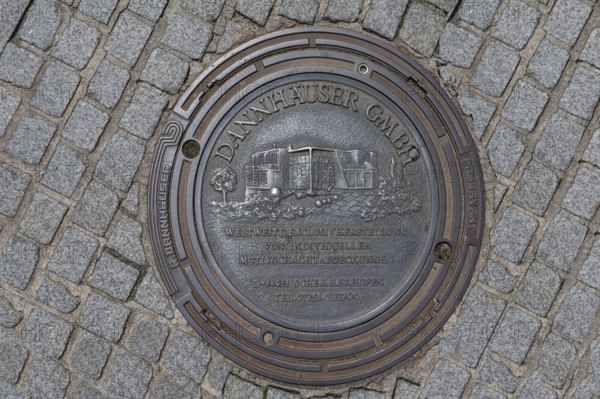 Manhole cover with self-advertising of the manhole cover manufacturer, Bad Kissingen, Lower