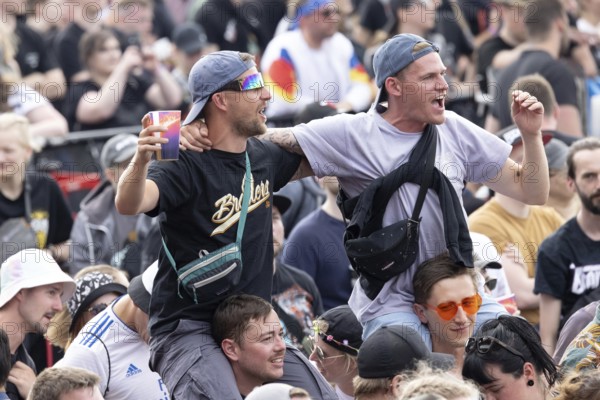 Adenau, Germany, 8 June 2024: Fans listen to the band Donots at Rock am Ring. The festival takes