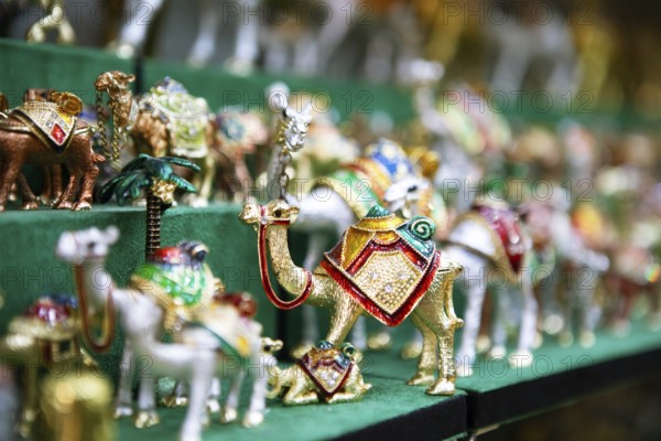 Souvenir camels in the souk or soug or market in the old town of Nizwa, ad-Dachiliyya region, Oman,
