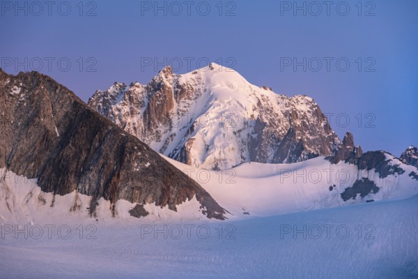 High alpine mountain landscape at sunset, Glacier du Tour, glacier and mountain peak, summit of the