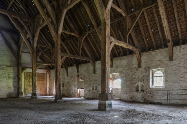 Interior showing wooden truss of 13th century Gothic monastic tithe barn of the Ter Doest Abbey at