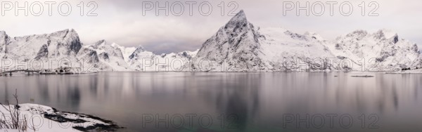 Panoramic picture, snowy mountains at the fjord, Hamnøy, Reine, Moskenesøya, Lofoten, Norway,