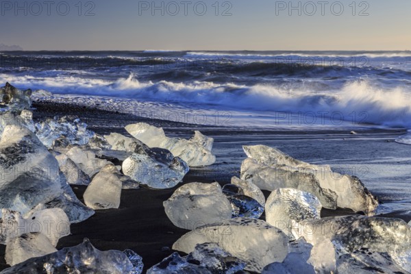 Ice floes on the beach, waves, sea, sunny, morning light, winter, Diamond Beach,