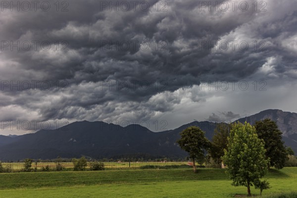 Dark storm clouds during a thunderstorm, storm, summer, mountain landscape, Loisach-Lake