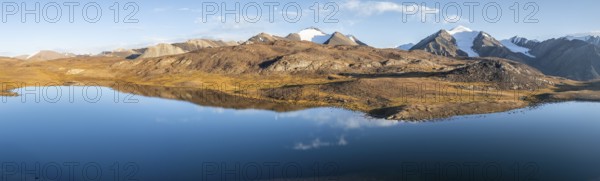 Aerial view, mountain peak and mountain lake, evening mood, Arabel Lake at Arabel Pass, Issyk Kul