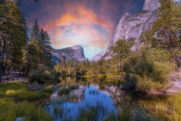 Reflections in the water of the Yosemite Mountains at Mirror Lake at sunset, Yosemite. California,