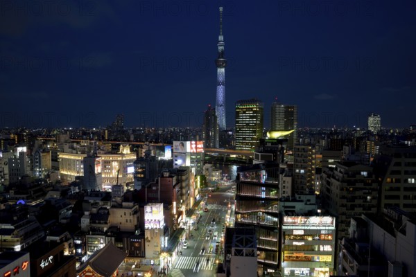 City view with the Skytree, with 634 meters the highest television tower of the earth, blue hour,