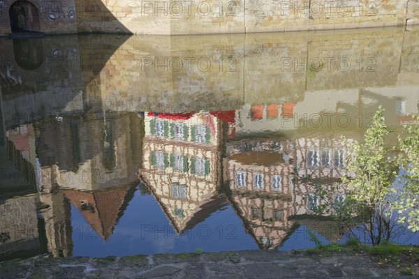 Reflection of half-timbered houses and St John's Church, Kocher Valley, Kocher, Schwäbisch Hall,