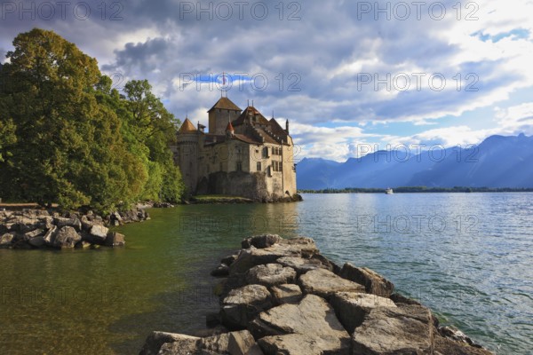 Lake in the mountains. Cold sunset Lake Geneva in the fall on sunny day. Montreux, Switzerland,
