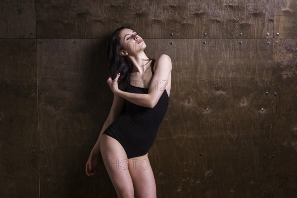 Young woman dancer. Young woman modern dance. Skill ballet dancer posing. dancer posing near the