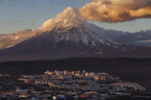 Evening colorful top view of townscape of Petropavlovsk-Kamchatsky City at sunset on background