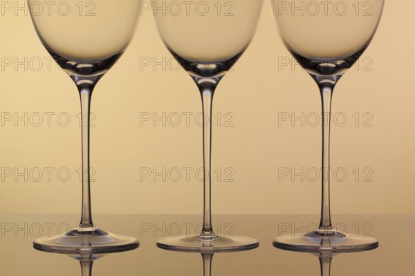Three empty glasses of wine on a clean background
