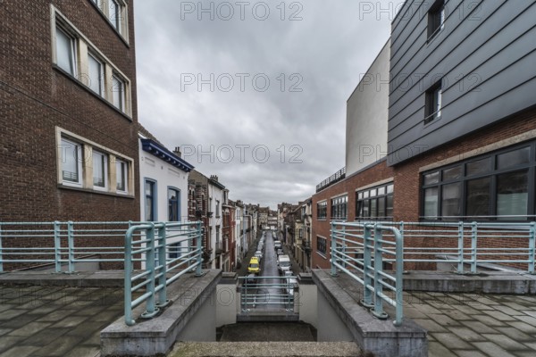 Belgium, 03 15 2019: The symmetric diagonal staircase of the dead end Auguste Snieder street with a